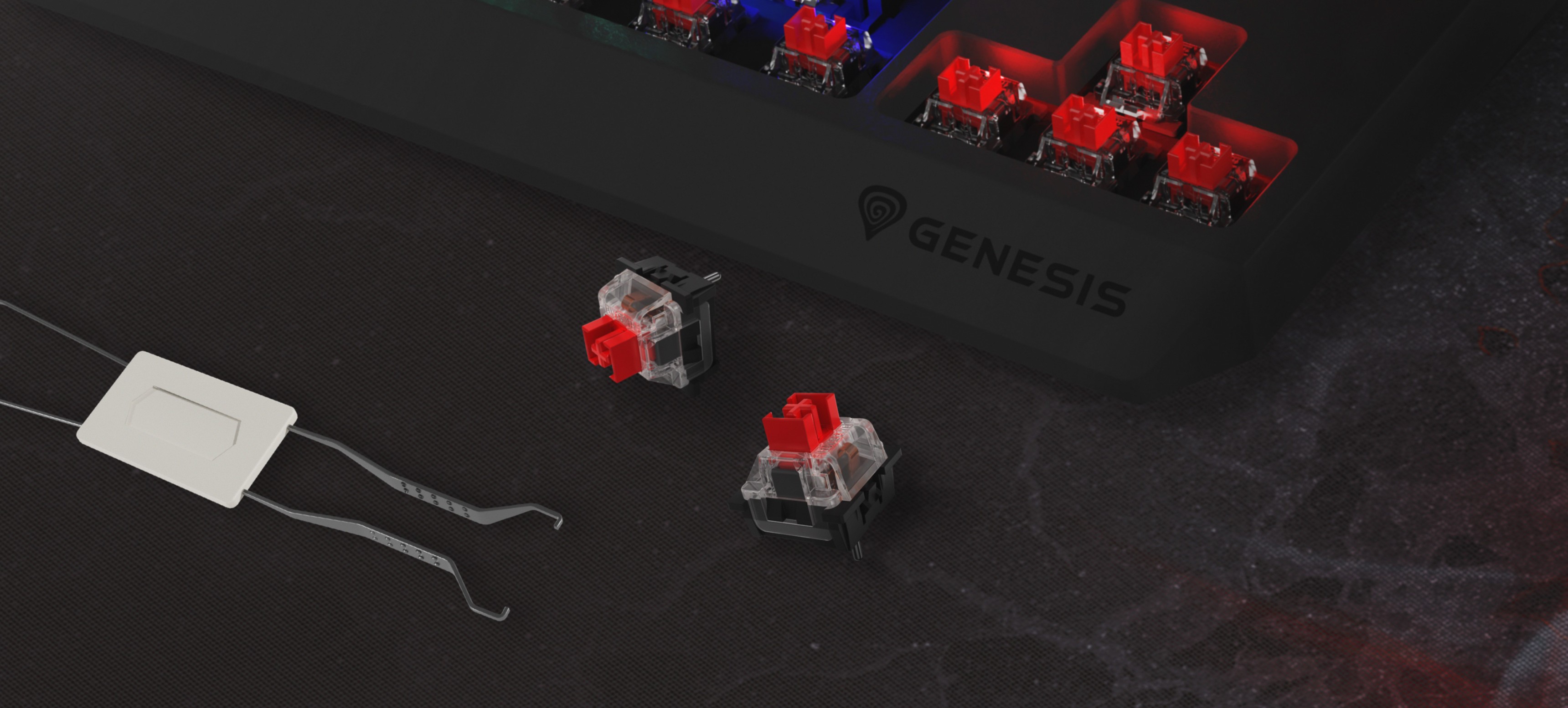 Prim plan al tastaturii de gaming Genesis Thor 230 TKL Lite cu comutatoare mecanice Outemu roșii și un instrument de extragere a comutatoarelor