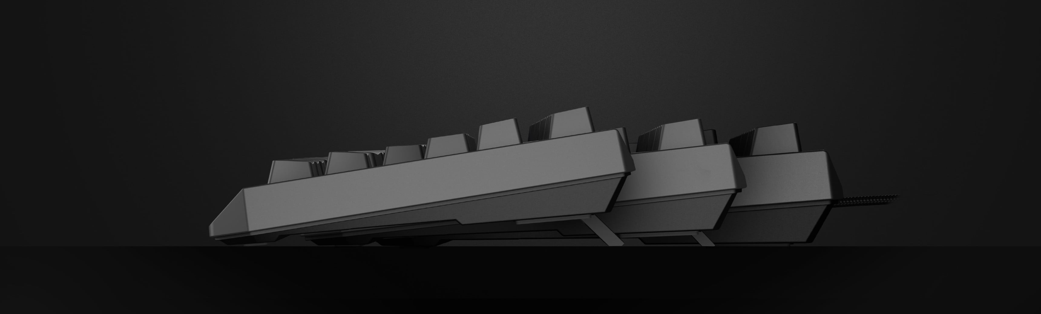 O tastatură mecanică de gaming neagră prezentată din lateral, cu comutatoare Outemu Red și un layout TKL compact